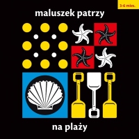 Maluszek patrzy. Na plaży